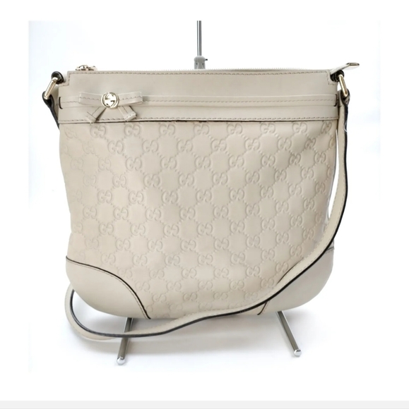 Gucci Handbags - 🎉HP🎉Gucci White Guccissima Leather Mayfair Crossbody Bag